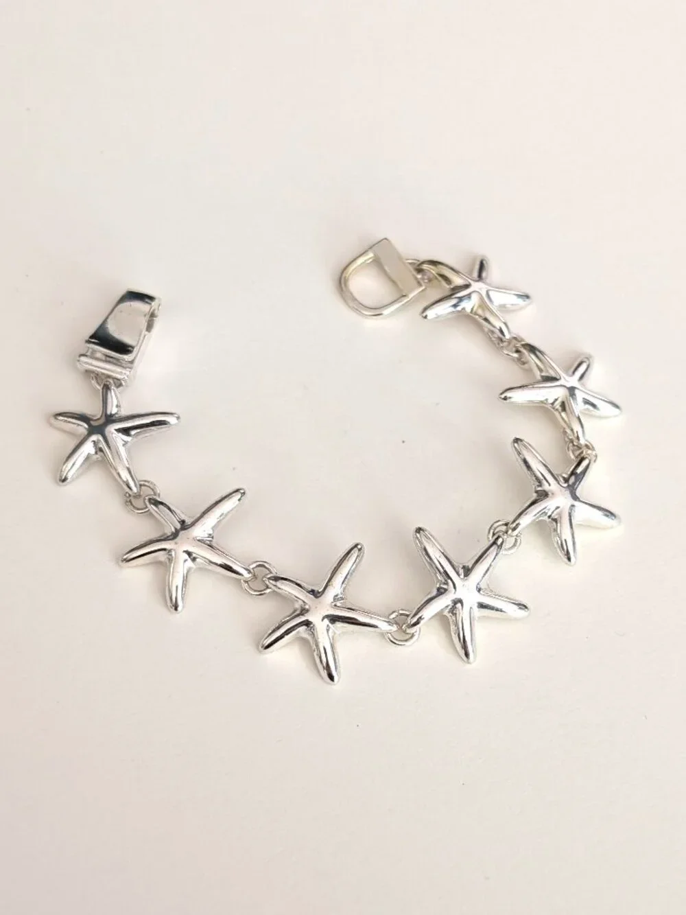 Silver starfish magnetic closure bracelet